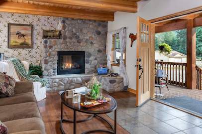 Curl up with a good book in our charming living room area.