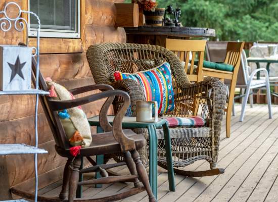 Wooden rockers for two on the front deck.